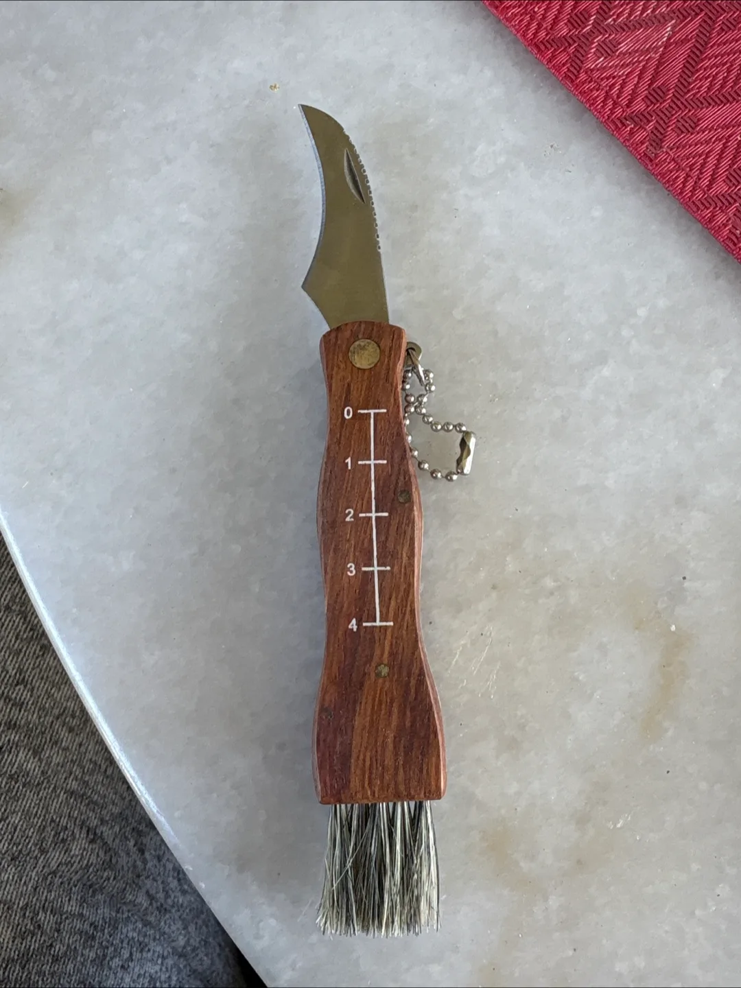 Pocket-Sized Cleaning Tool with Knife and Brush