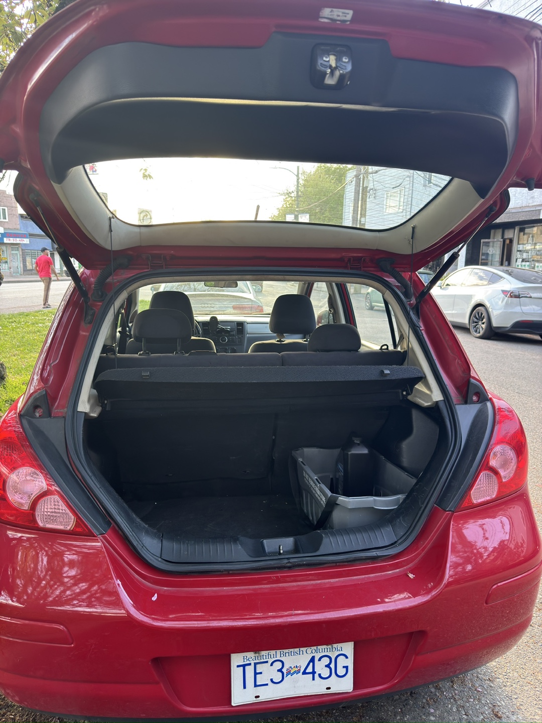 Red Nissan Versa Hatchback - photo 3
