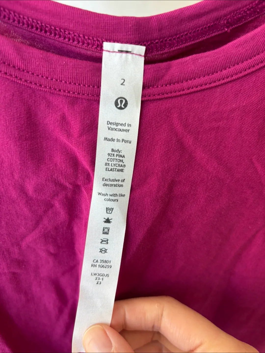 Lululemon Twist Front Short Sleeve Top size 2 image indicator(3)