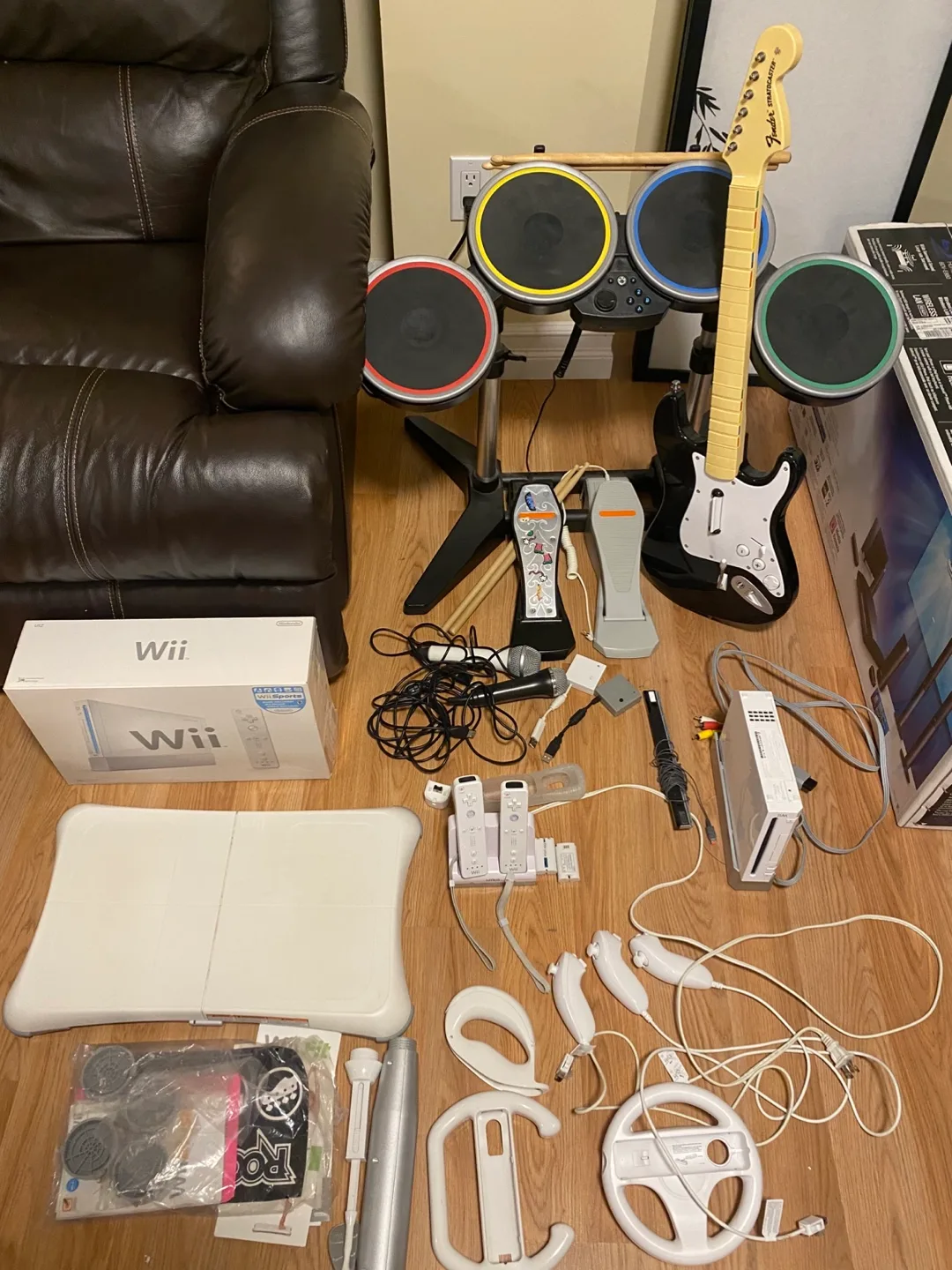 Wii console with Guitar Hero and accessories thumbnail