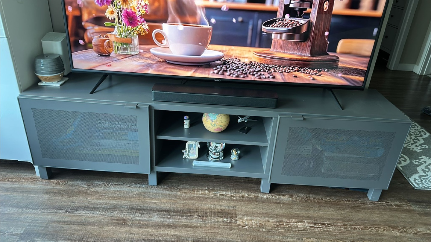 Gray TV Stand with Perforated Doors