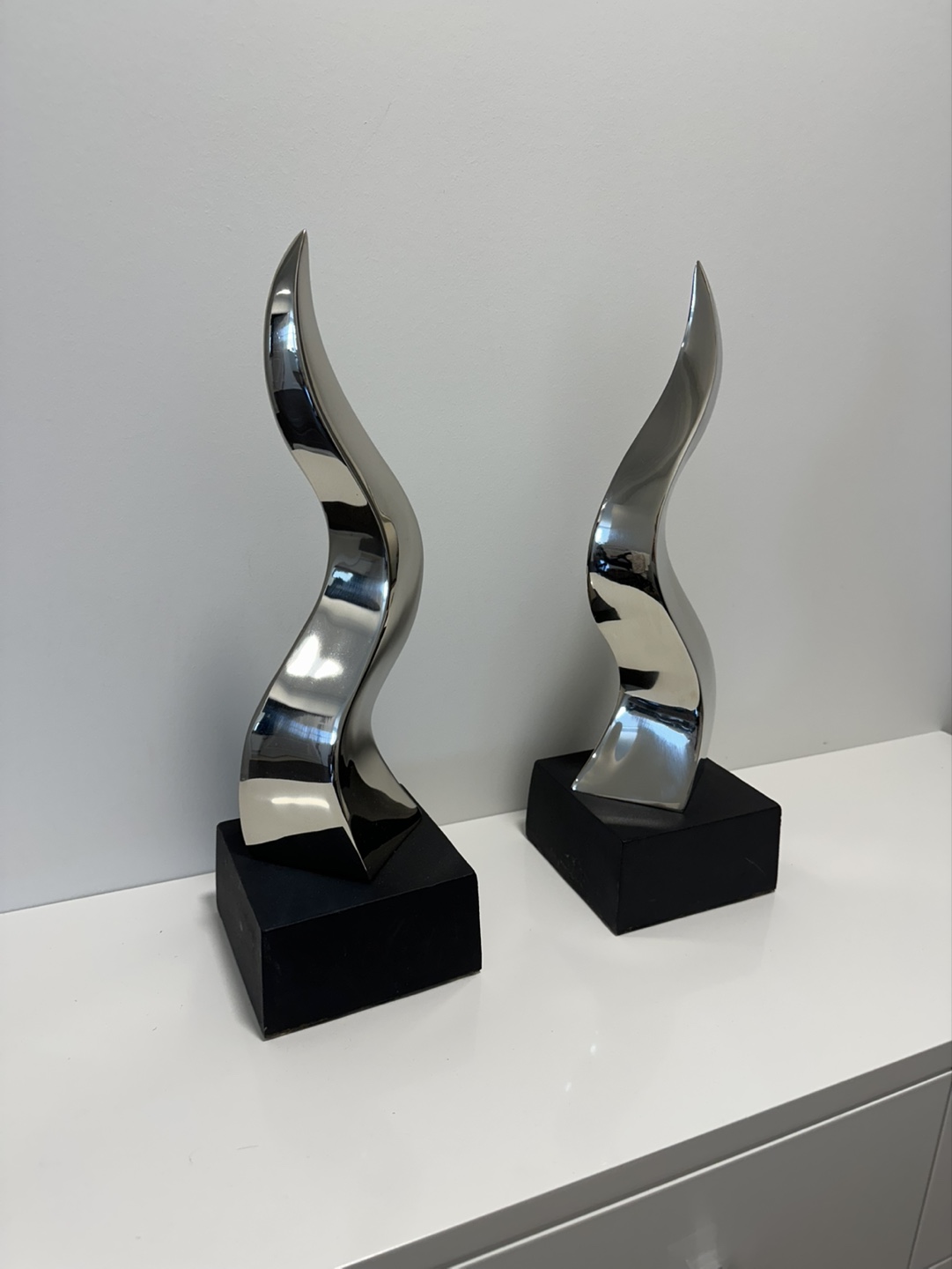 Pair of Modern Silver Sculptures