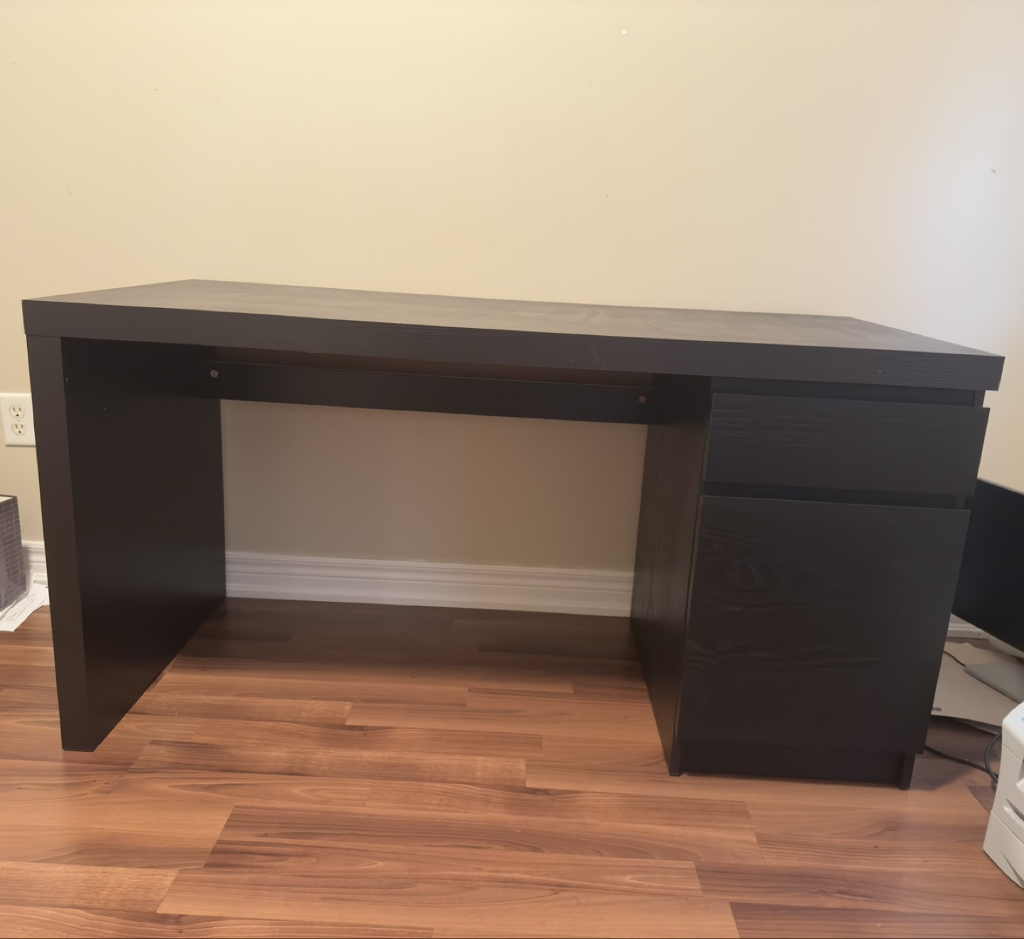 Dark brown writing desk with drawers
