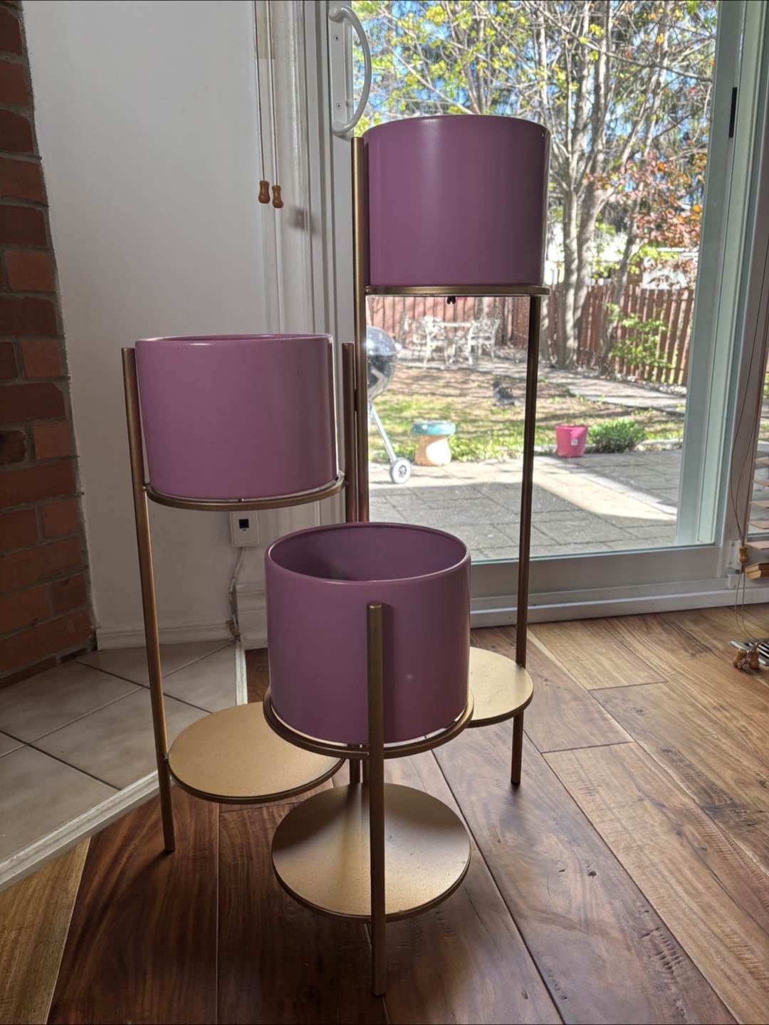 Three-Tiered Plant Stand with pink Pots