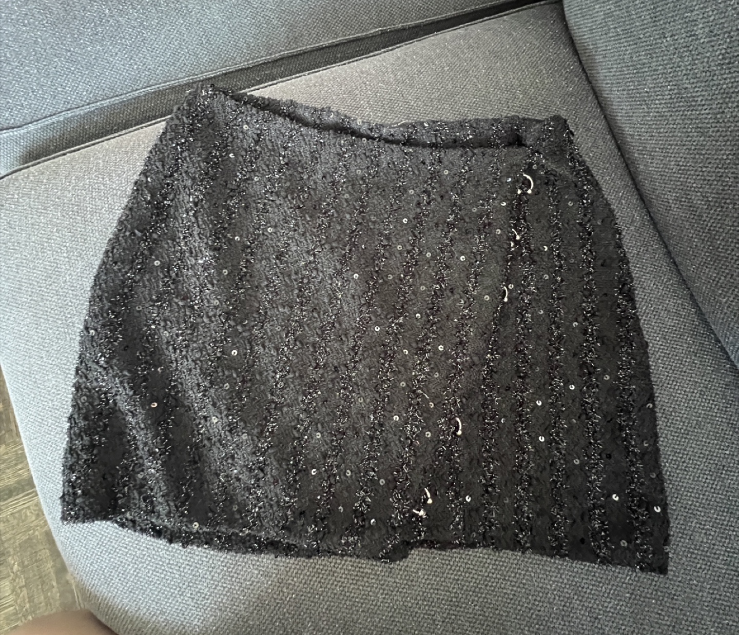 Sequined black mini skirt