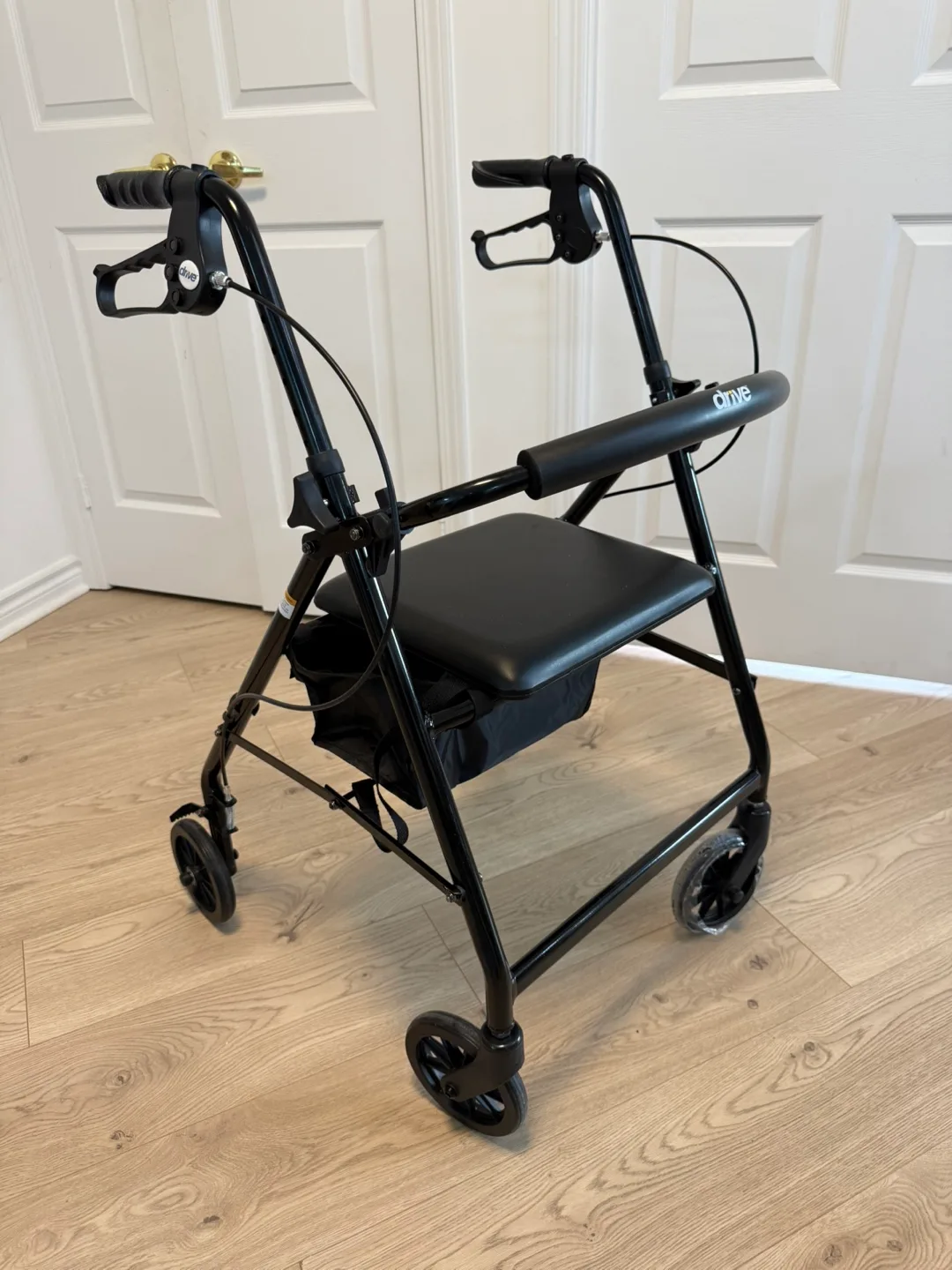 Drive Medical Rollator Walker in black with Brakes and Seat