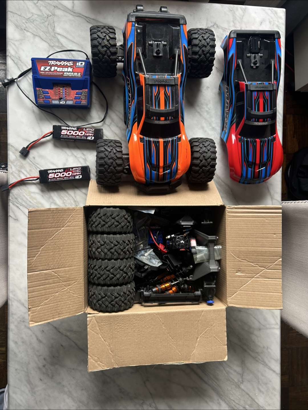 Traxxas Maxx RC Truck - 2 bodies, extra parts, and charger - photo 5