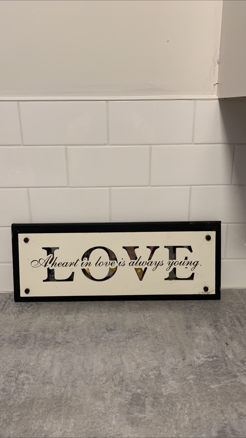 A heart in love always young sign