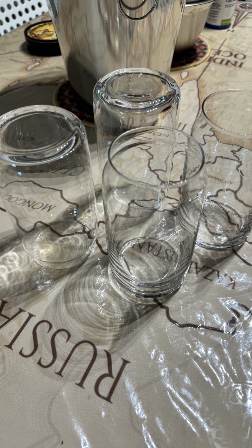 Moving out sale ** Set of four clear drinking glasses