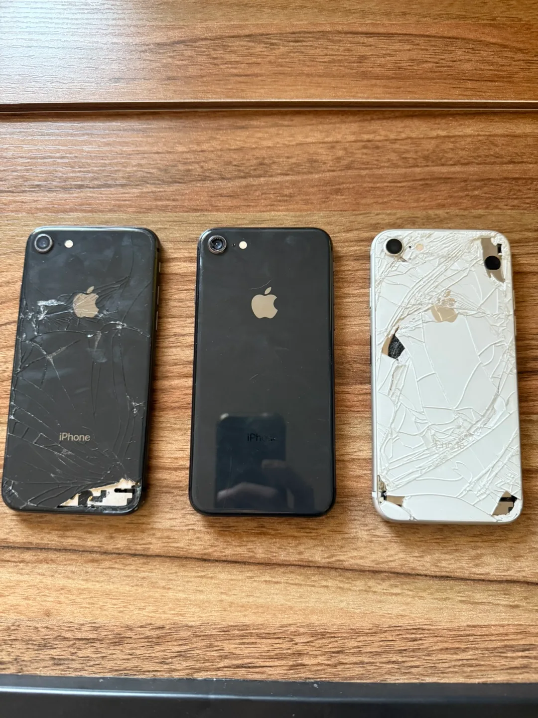 Three Damaged iPhone 8’s for Parts or Repair thumbnail