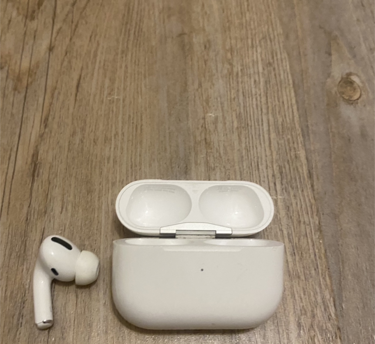 Apple AirPods Pro Charging Case and One AirPod
