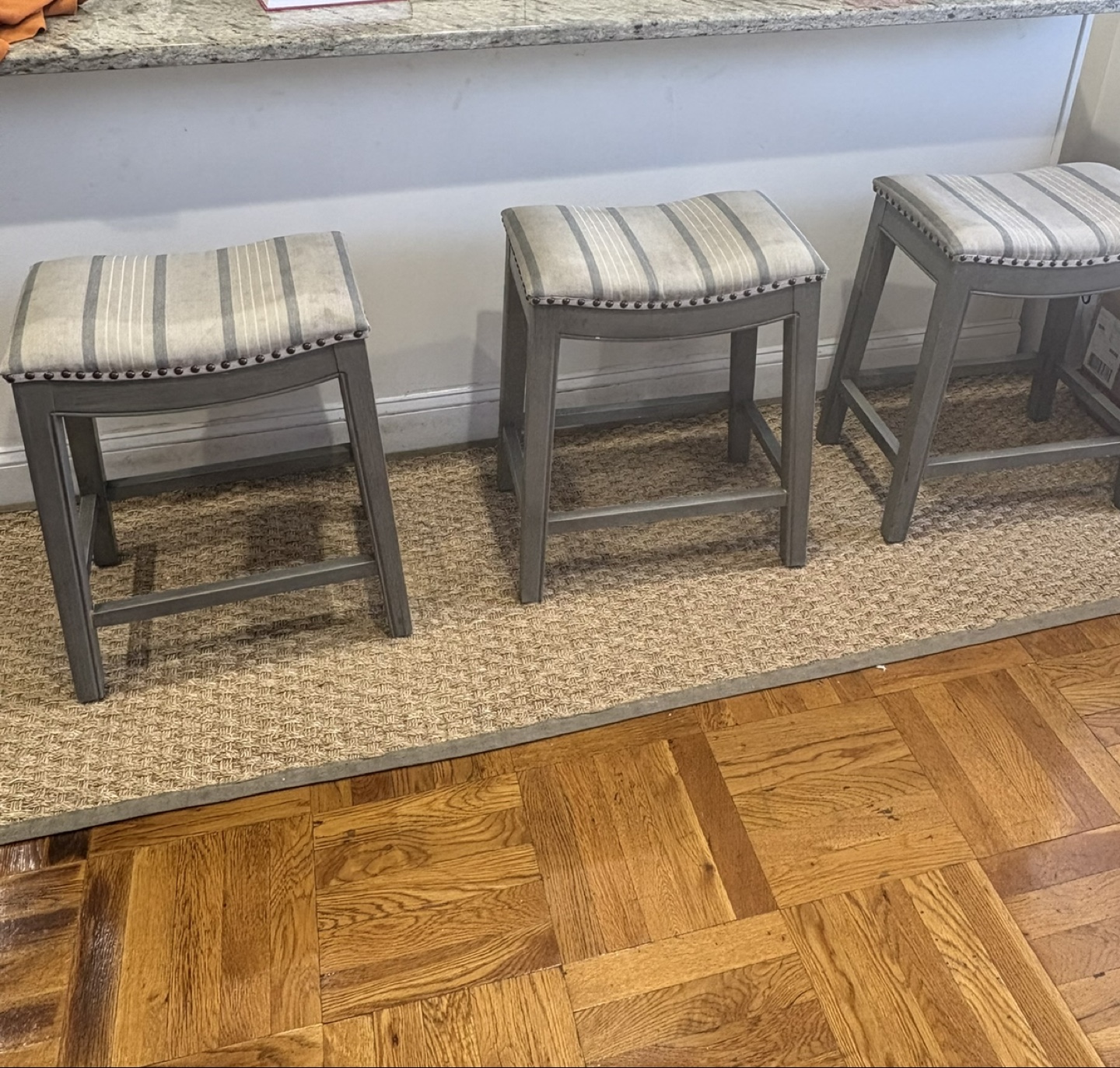 Set of Three Grey Striped Upholstered Bar Stools
