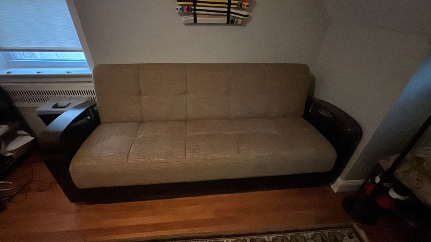 Beige Sofa Bed with Dark Wood Accents