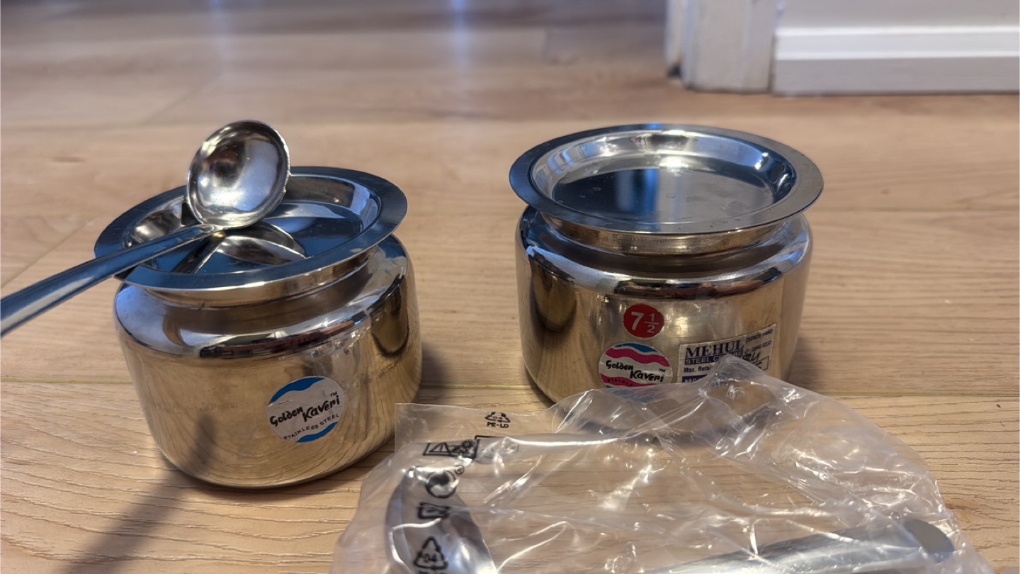 Two Stainless Steel Containers with Lids and Spoons