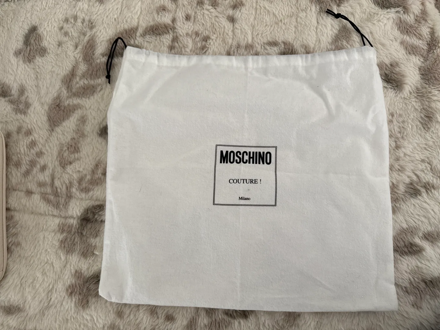 Moschino Couture black leather clutch with teddy bear design image indicator(3)