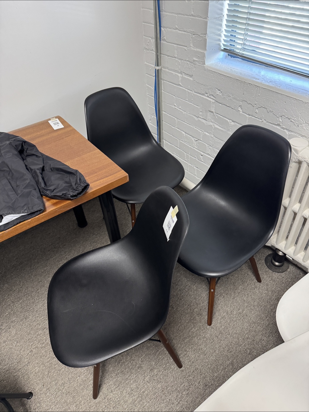 Three Black Plastic Dining Chairs with Wooden Legs