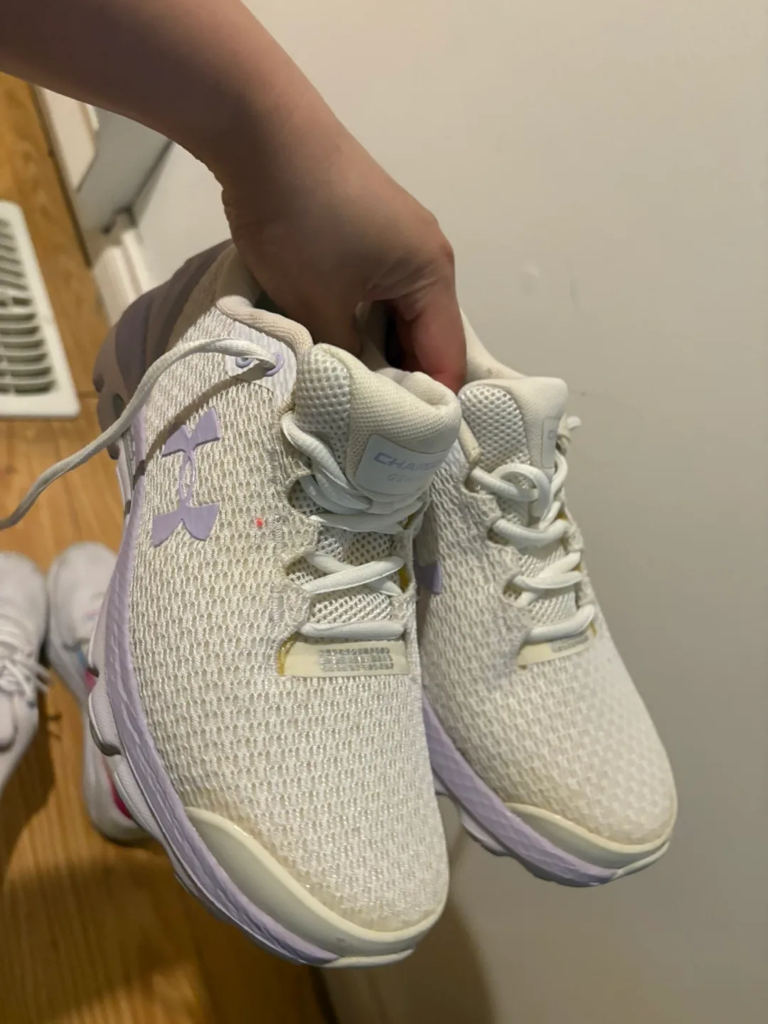 Two pairs of women's running shoes image indicator(4)