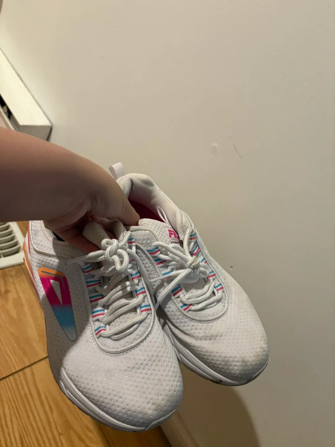 Two pairs of women's running shoes image indicator(2)