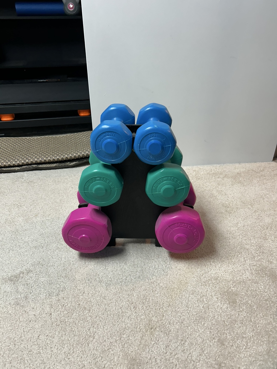 Three sets of Dumbbells with Rack