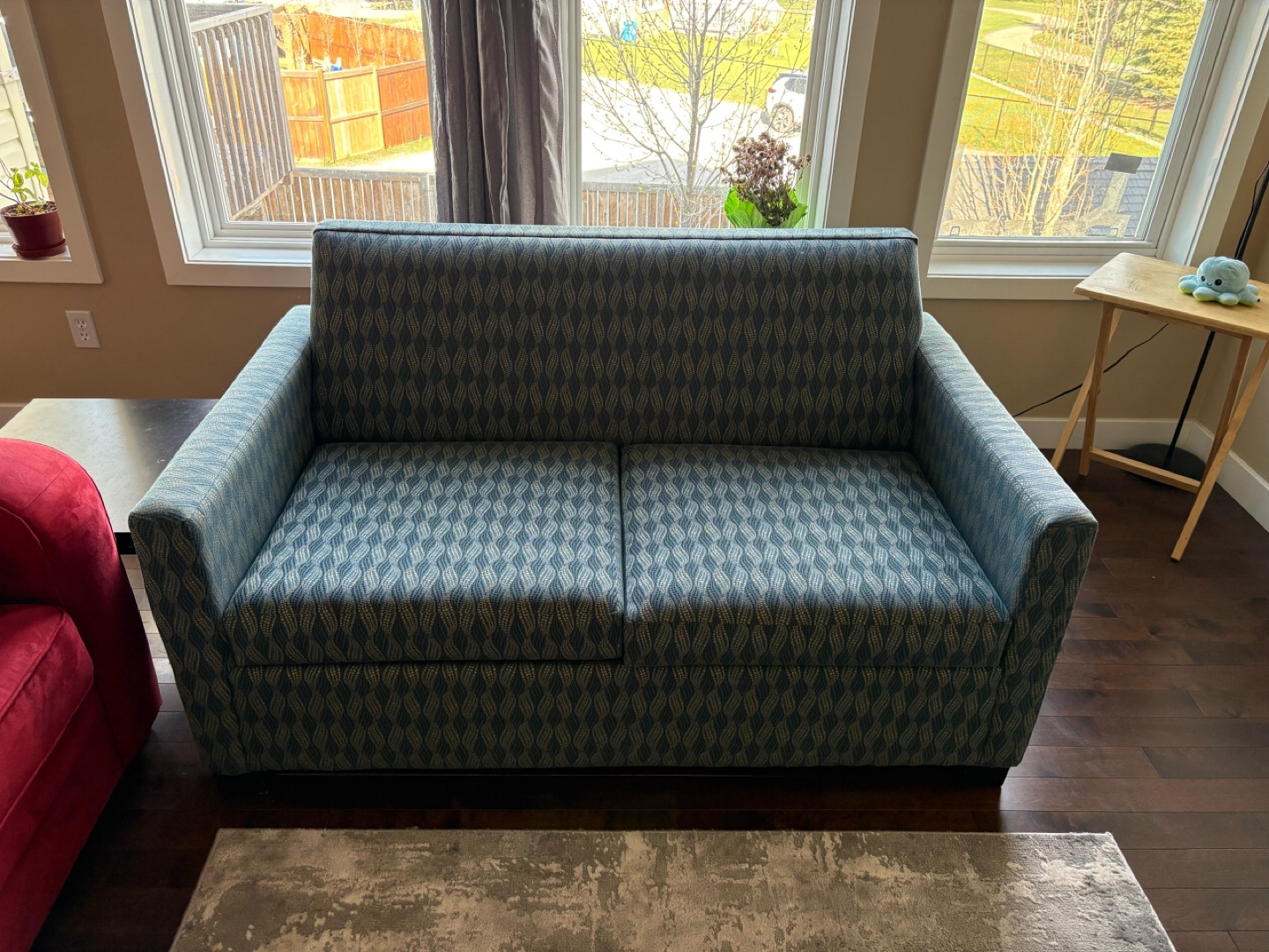Blue patterned futon sofa bed