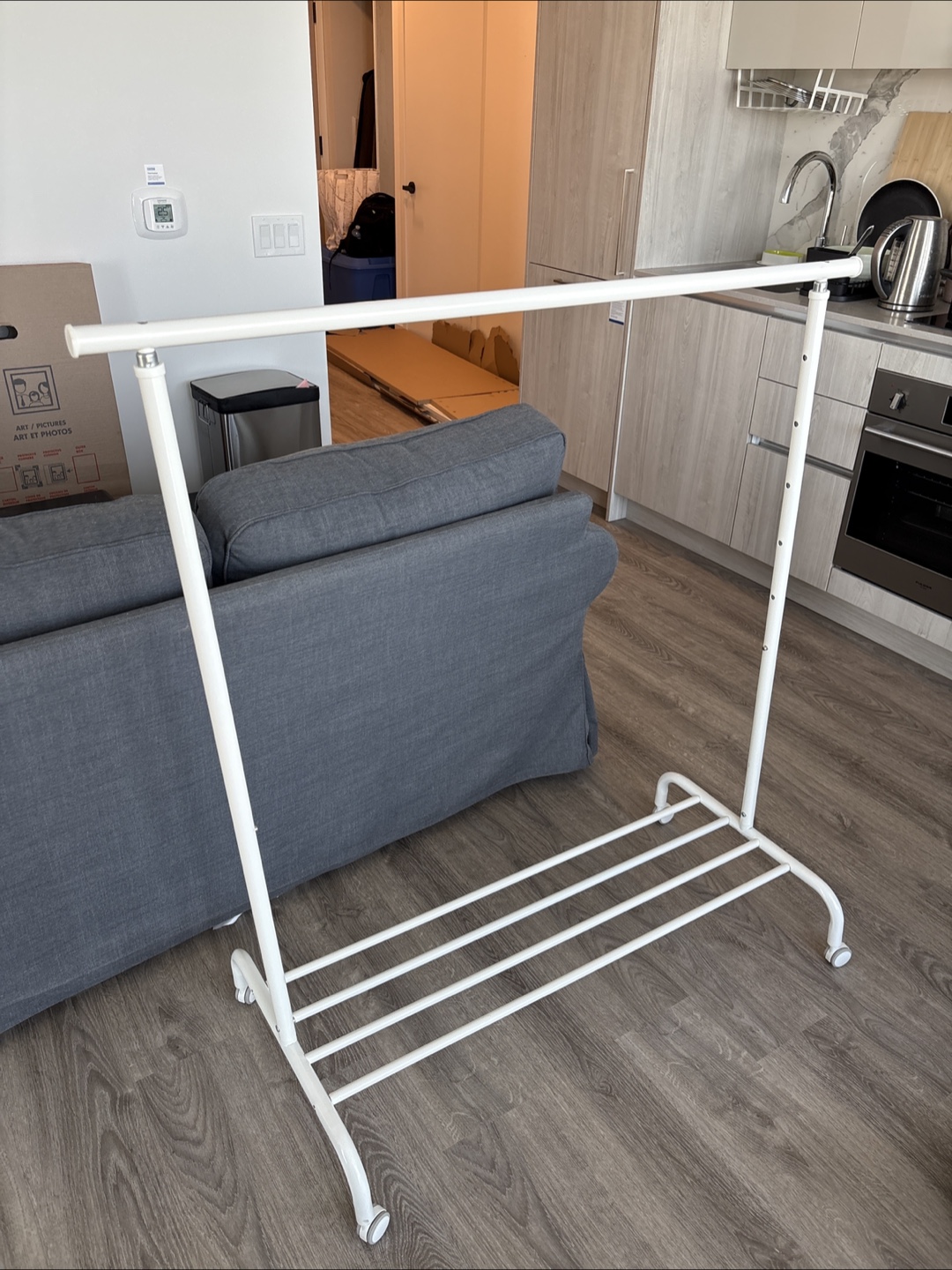 White Clothing Rack with Wheels
