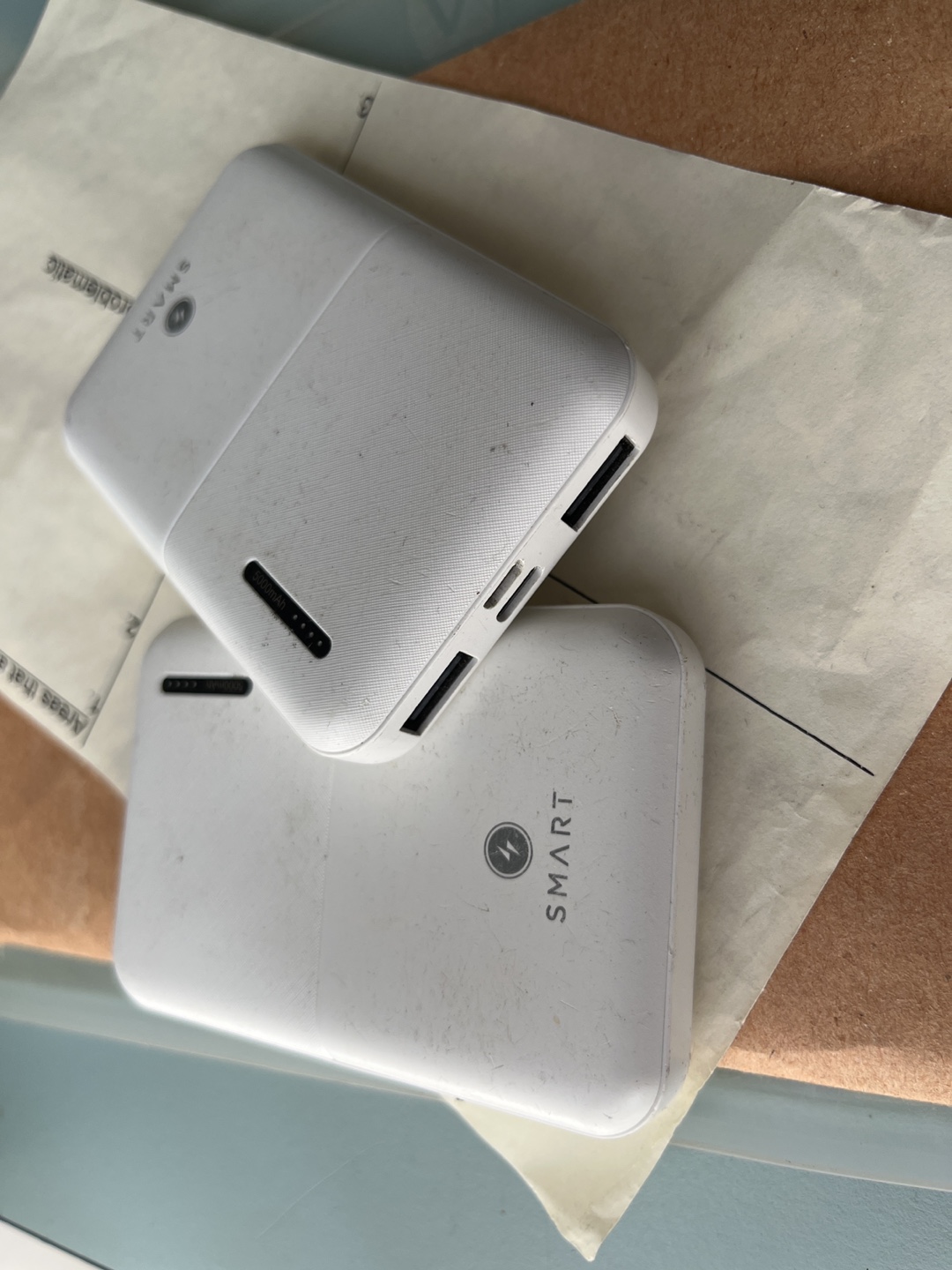 Two SMART portable chargers