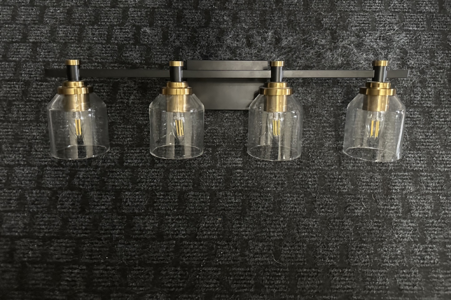 Four-Light Vanity Light Fixture - Black and Gold