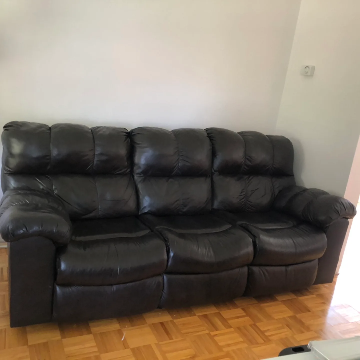 Brown Leather Reclining Sofa