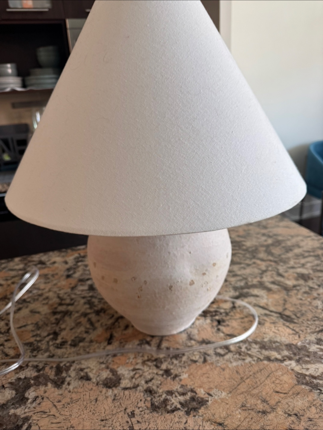 Cream ceramic table lamp with conical shade