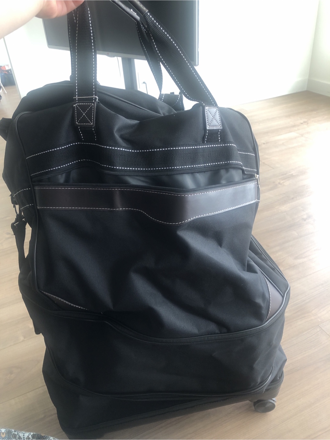 Black Rolling Duffle Bag