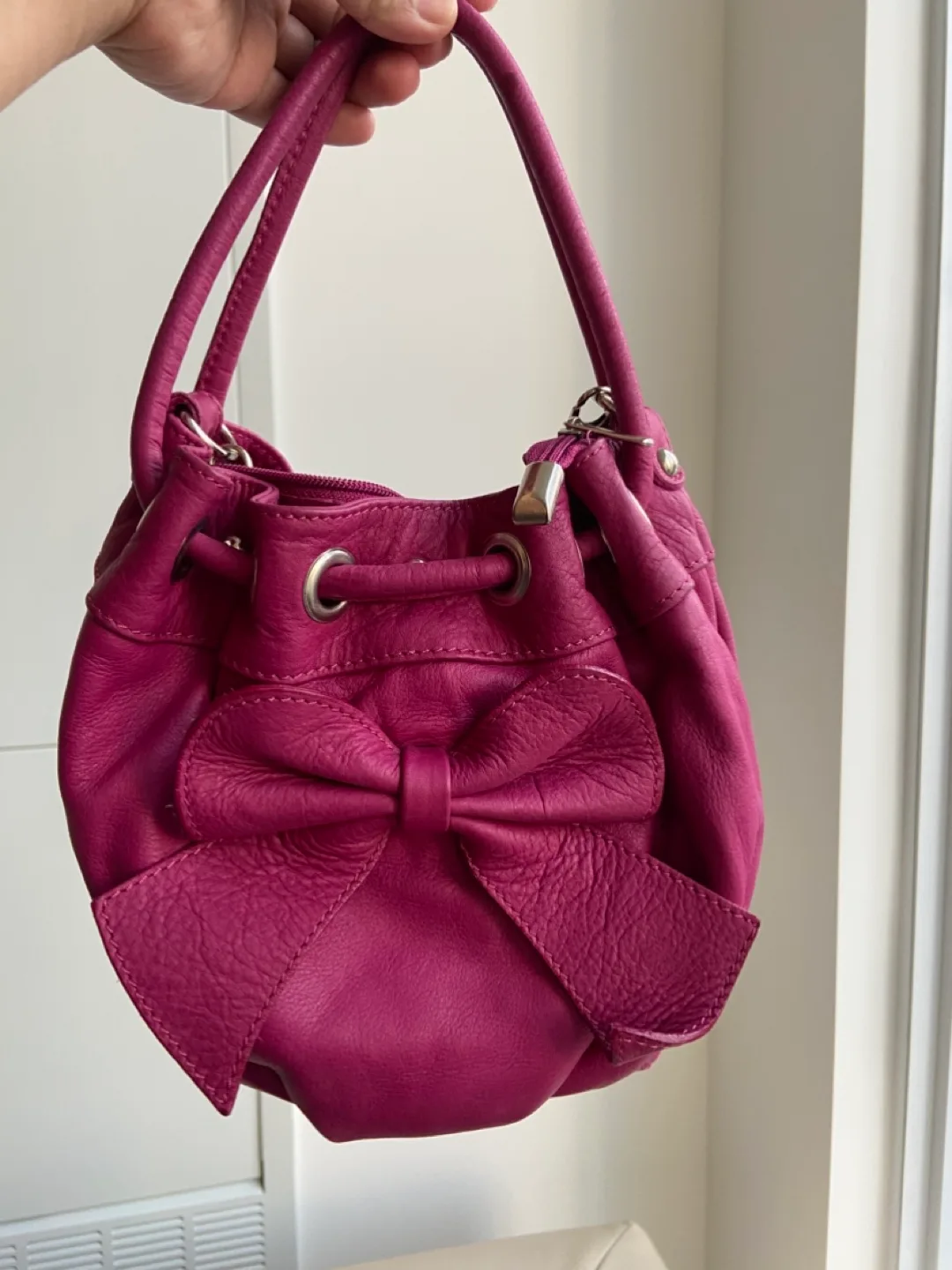 Fuchsia Pink Mini Leather Drawstring Bag image indicator(4)