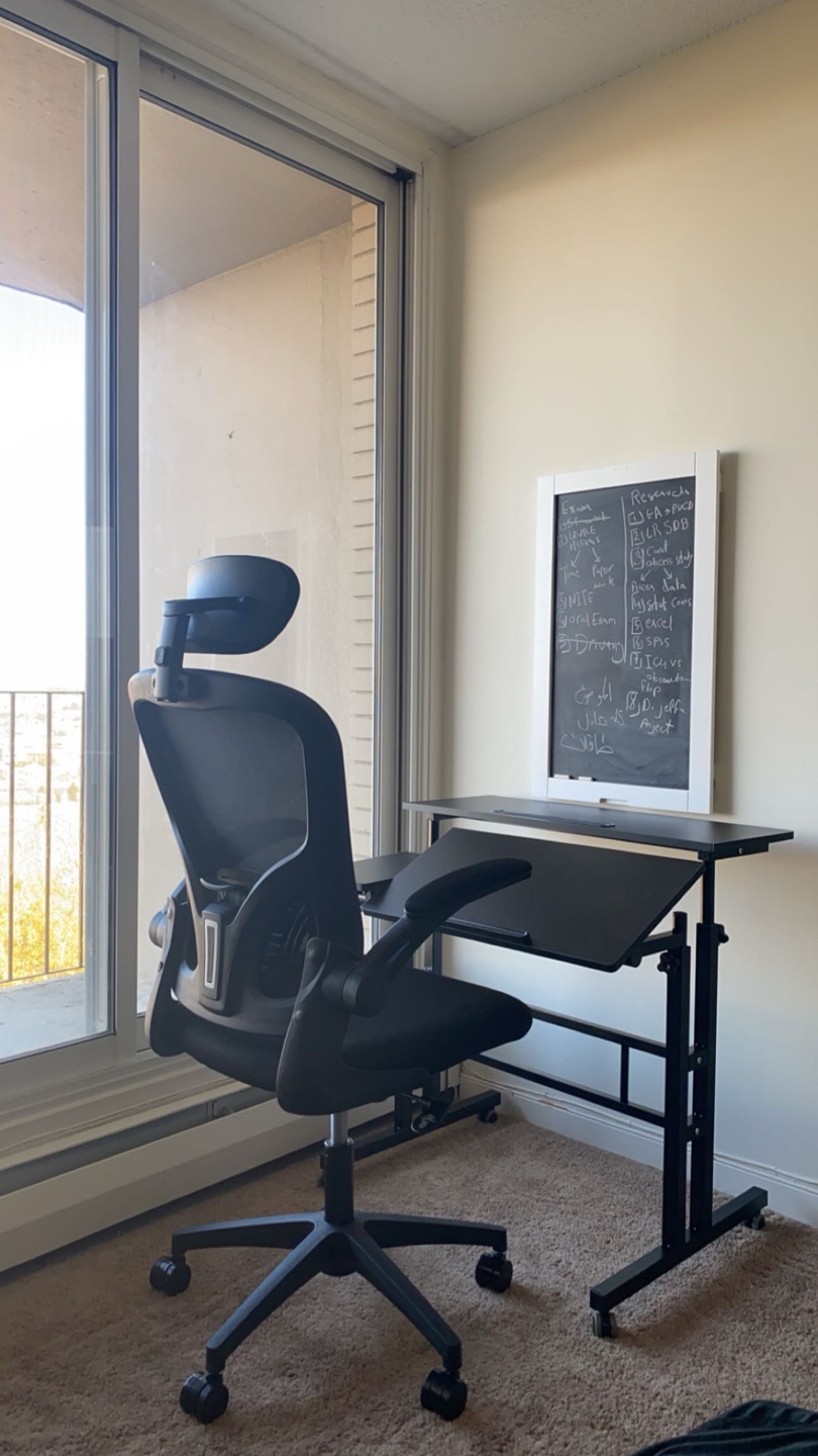 Black Ergonomic Office Chair and Adjustable Laptop Desk