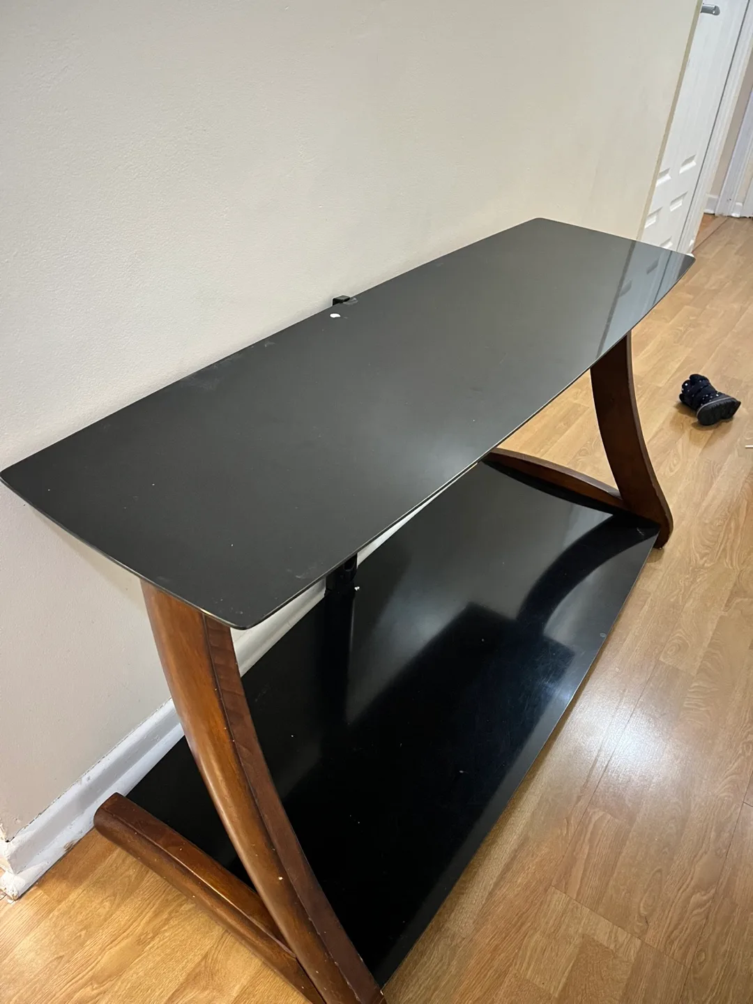 Black Glass TV Stand with Wood Accents image indicator(4)