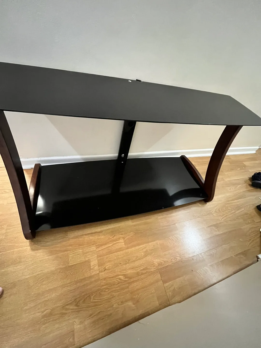 Black Glass TV Stand with Wood Accents image indicator(2)