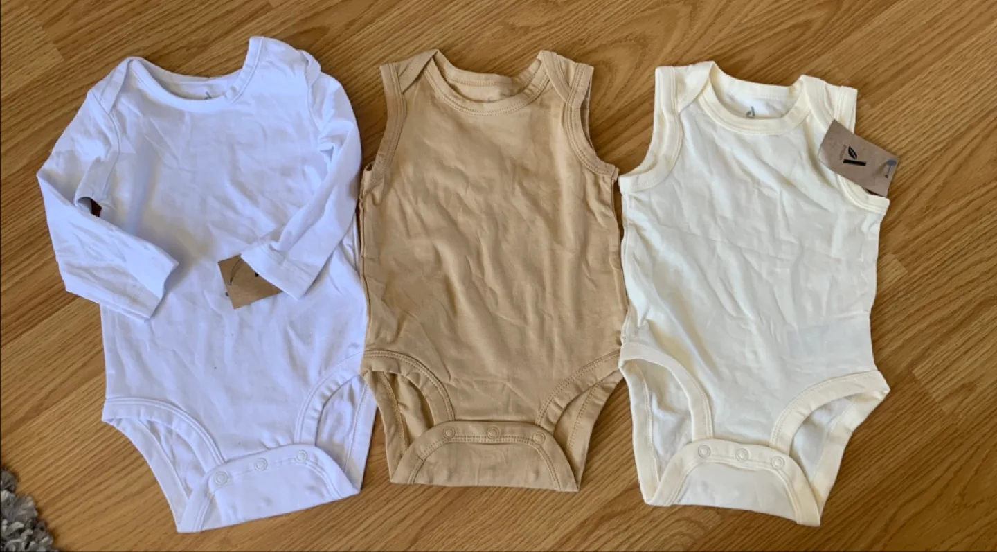 Three Baby Bodysuits - White, Beige, and Cream - 9 Months image indicator(2)