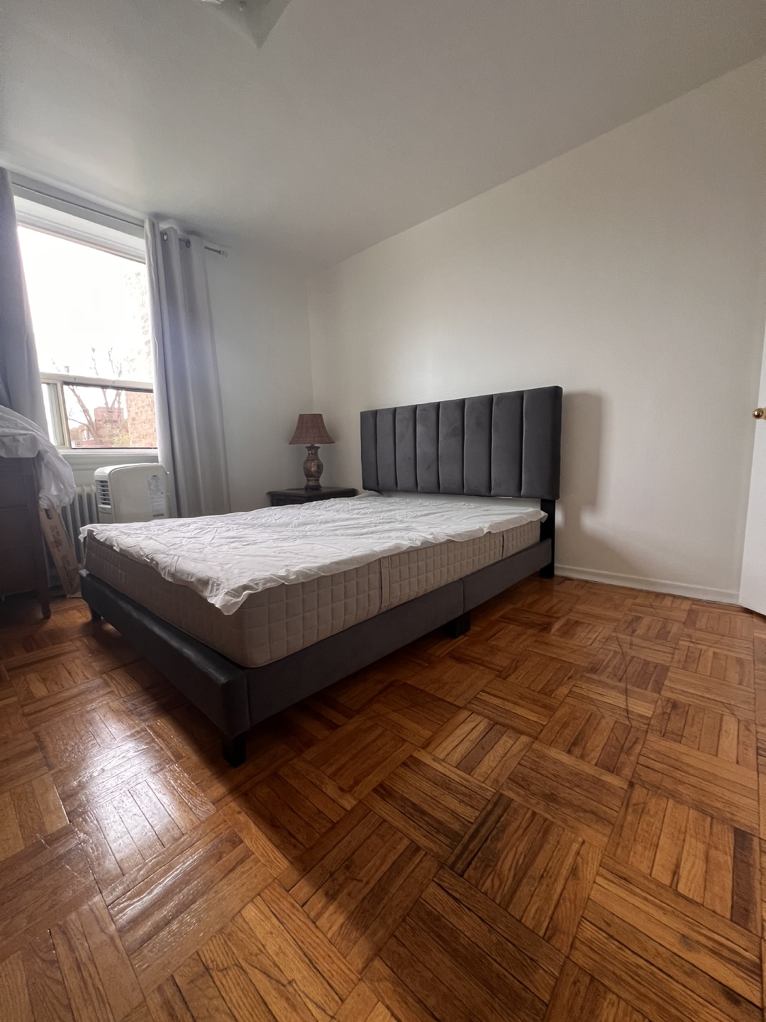 Queen-size upholstered bed frame