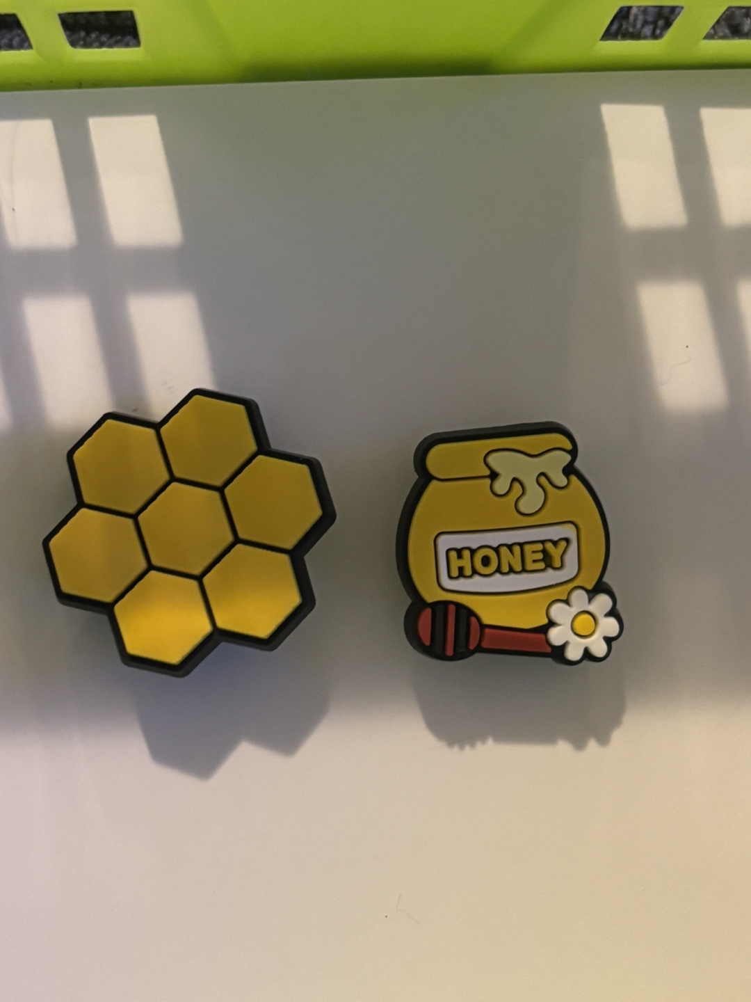 2 Honey-themed Jibbitz charms