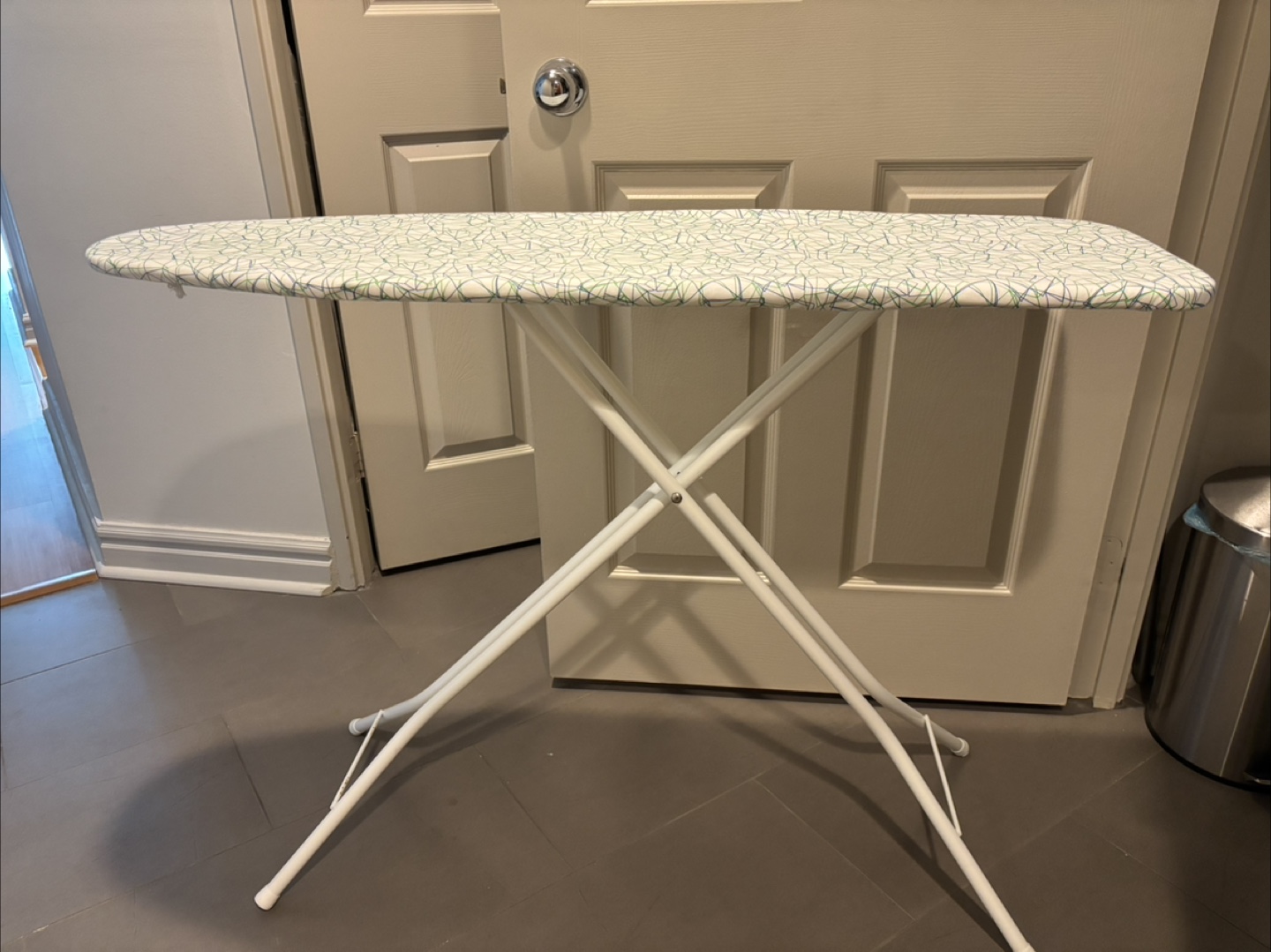 White Ironing Board with Geometric Pattern Cover