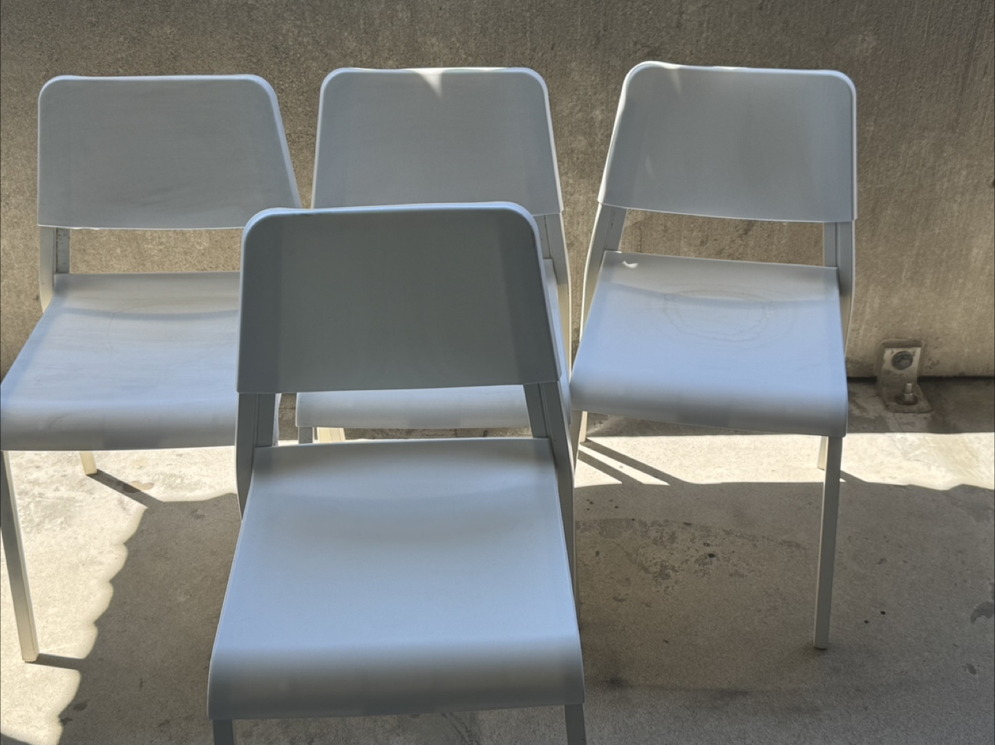 Four White Plastic Chairs - photo 2