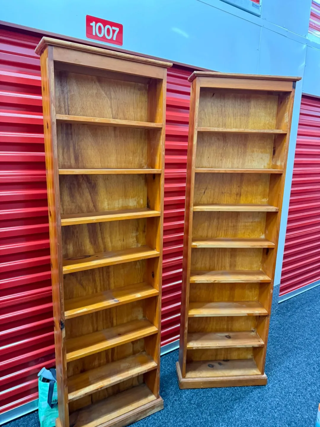 Pair of Tall Wooden Bookcases thumbnail