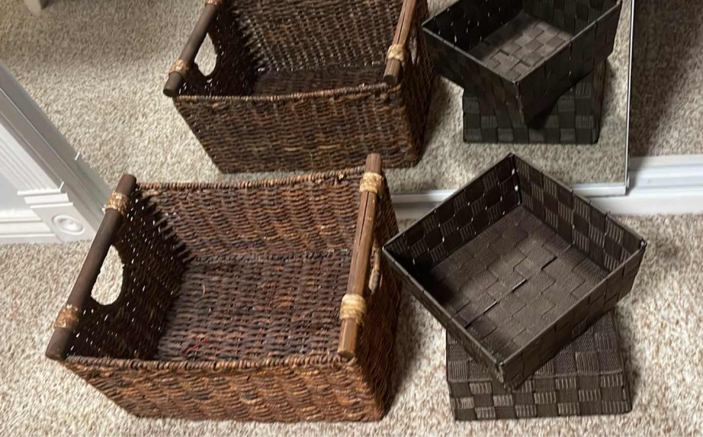 Three Brown Storage Baskets