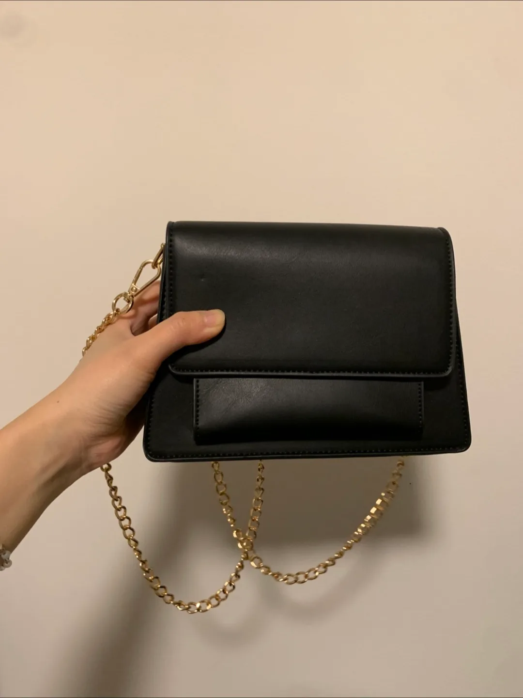 Black crossbody bag with gold chain strap thumbnail