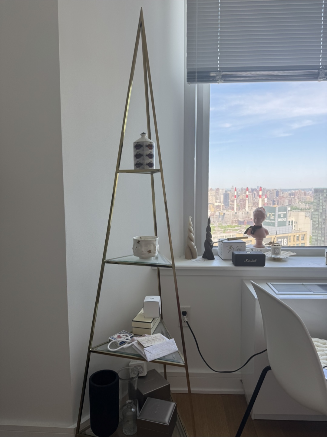 Gold Metal Triangular 3 Tier Shelf for $60