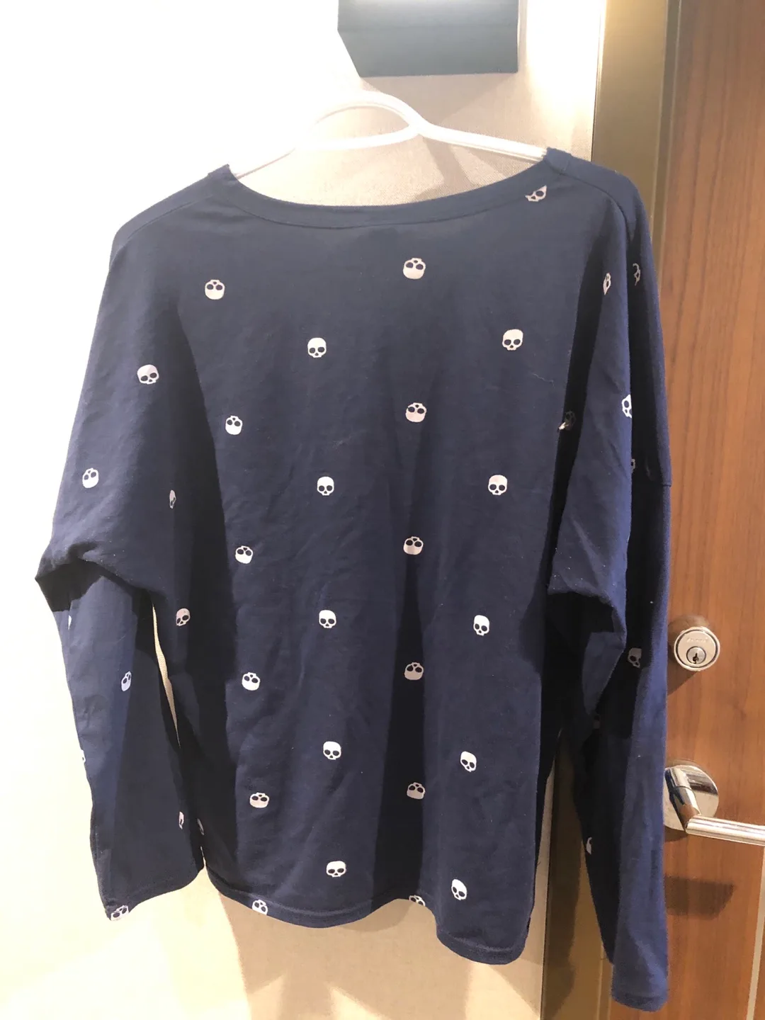 🏒 Women's long sleeve navy blue skull print top image indicator(3)