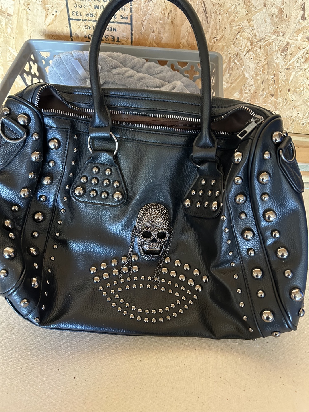 Black Studded Handbag with Skull Detail