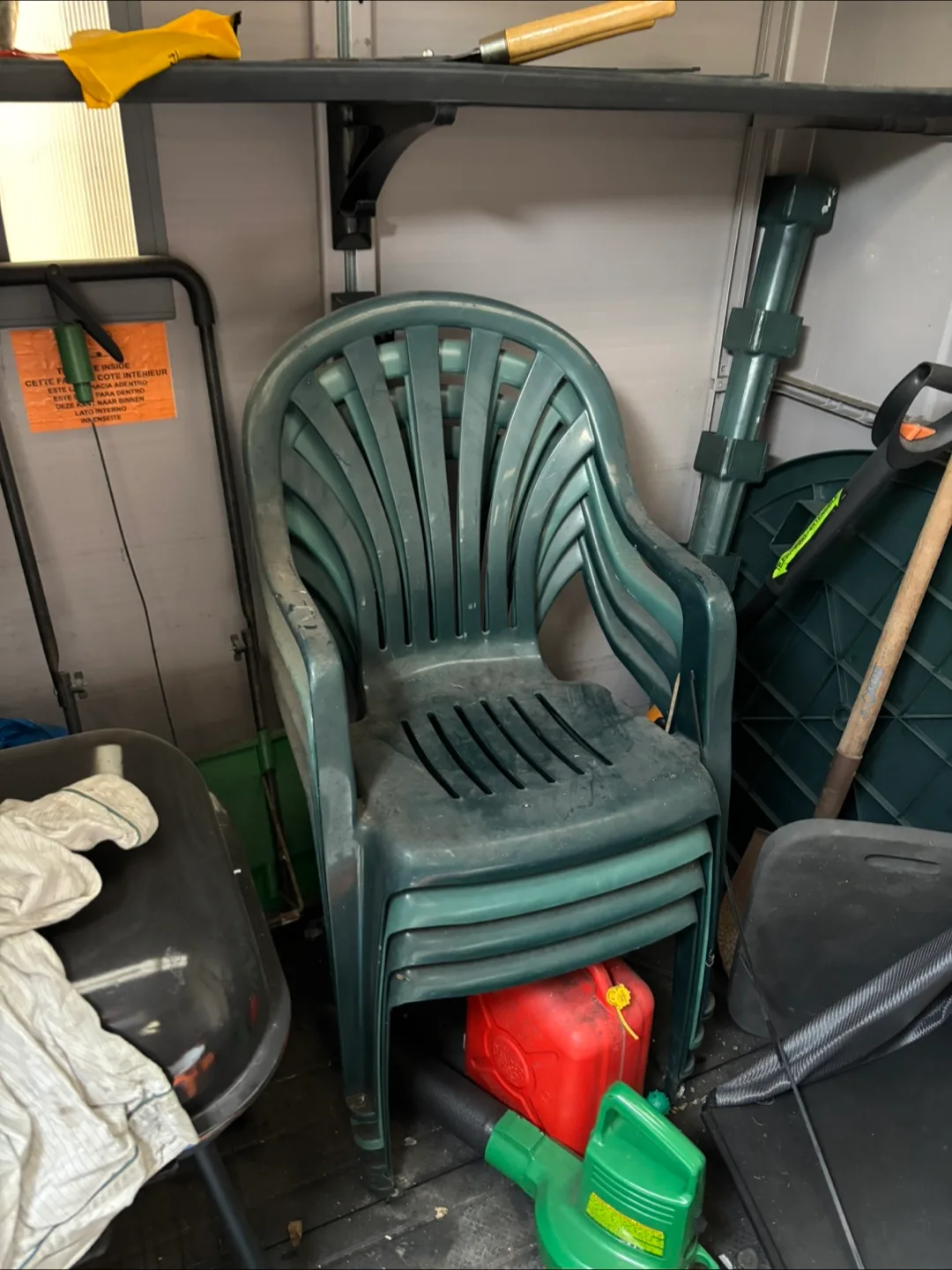 Stack of 4 Green Plastic Outdoor Chairs thumbnail