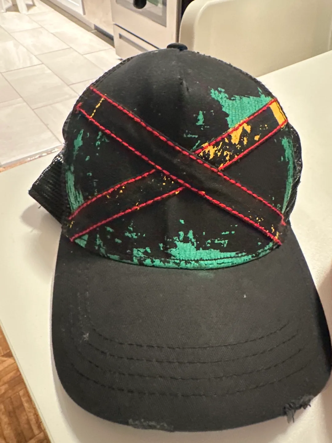 Black Trucker Hat with Jamaican Flag Design thumbnail