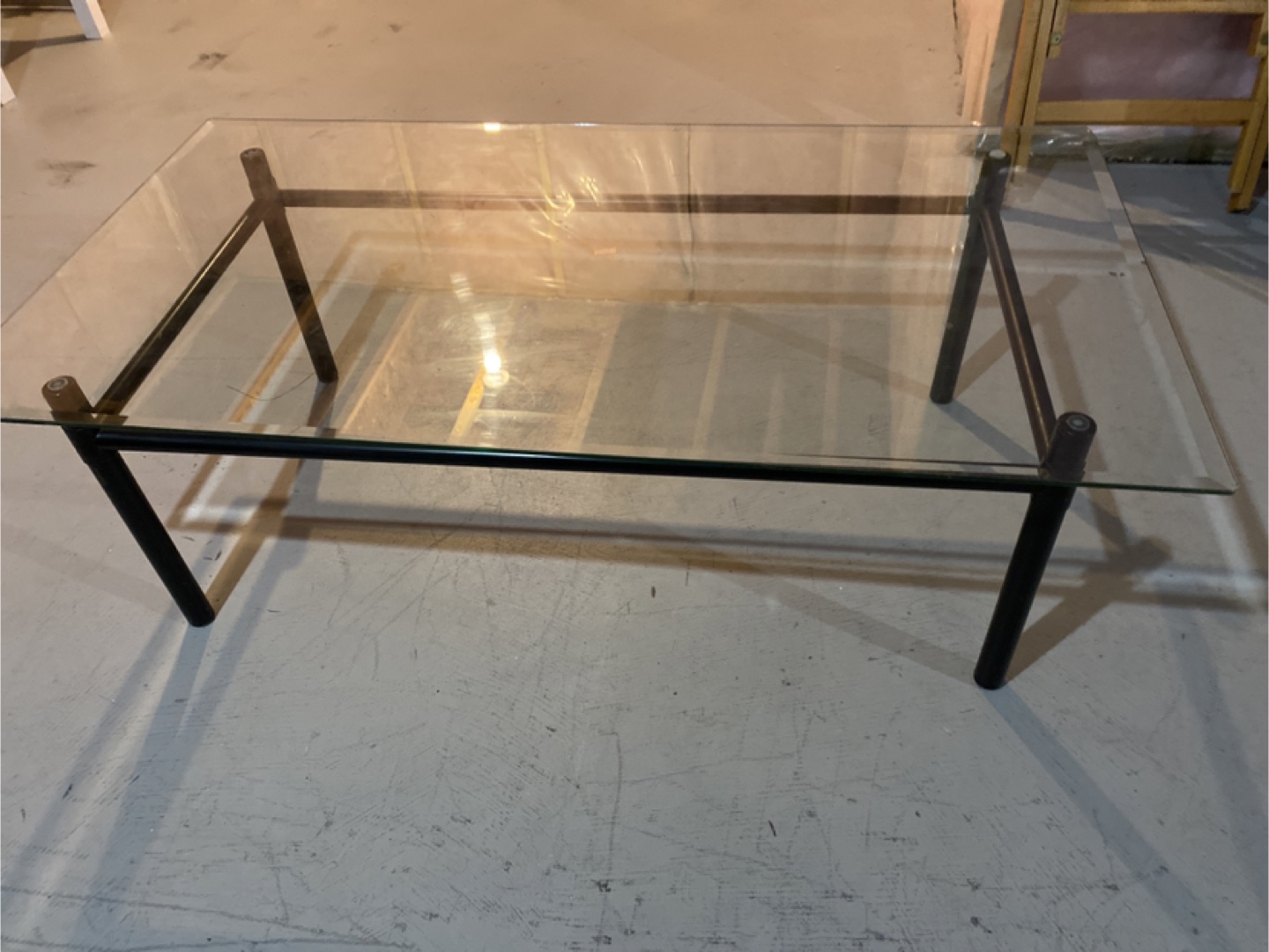 Glass top coffee table with black metal frame - photo 2