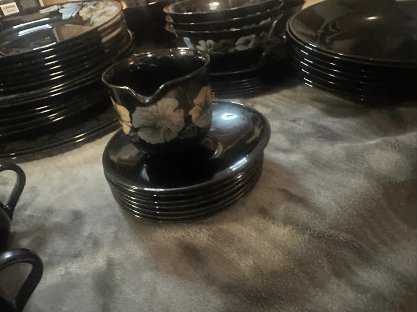 Vintage Black Glass Dinnerware Set with Floral Design image indicator(10)