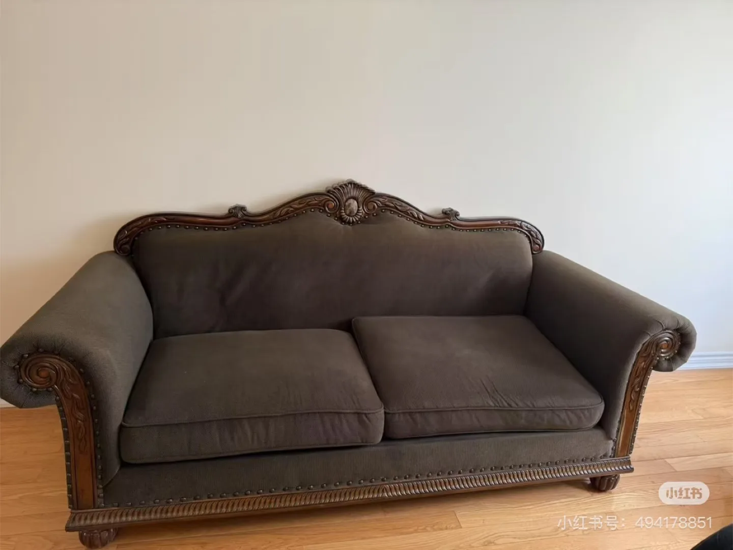 Dark Brown Sofa with Ornate Wooden Frame thumbnail